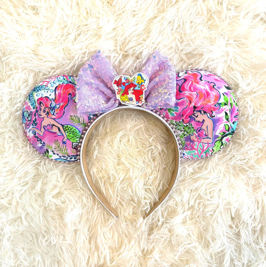 Mermaid Dreams Boutique Mouse Ear Headband with colorful mermaid-inspired print ears, lavender sequin bow, and handcrafted boutique design by Pixie Park Company