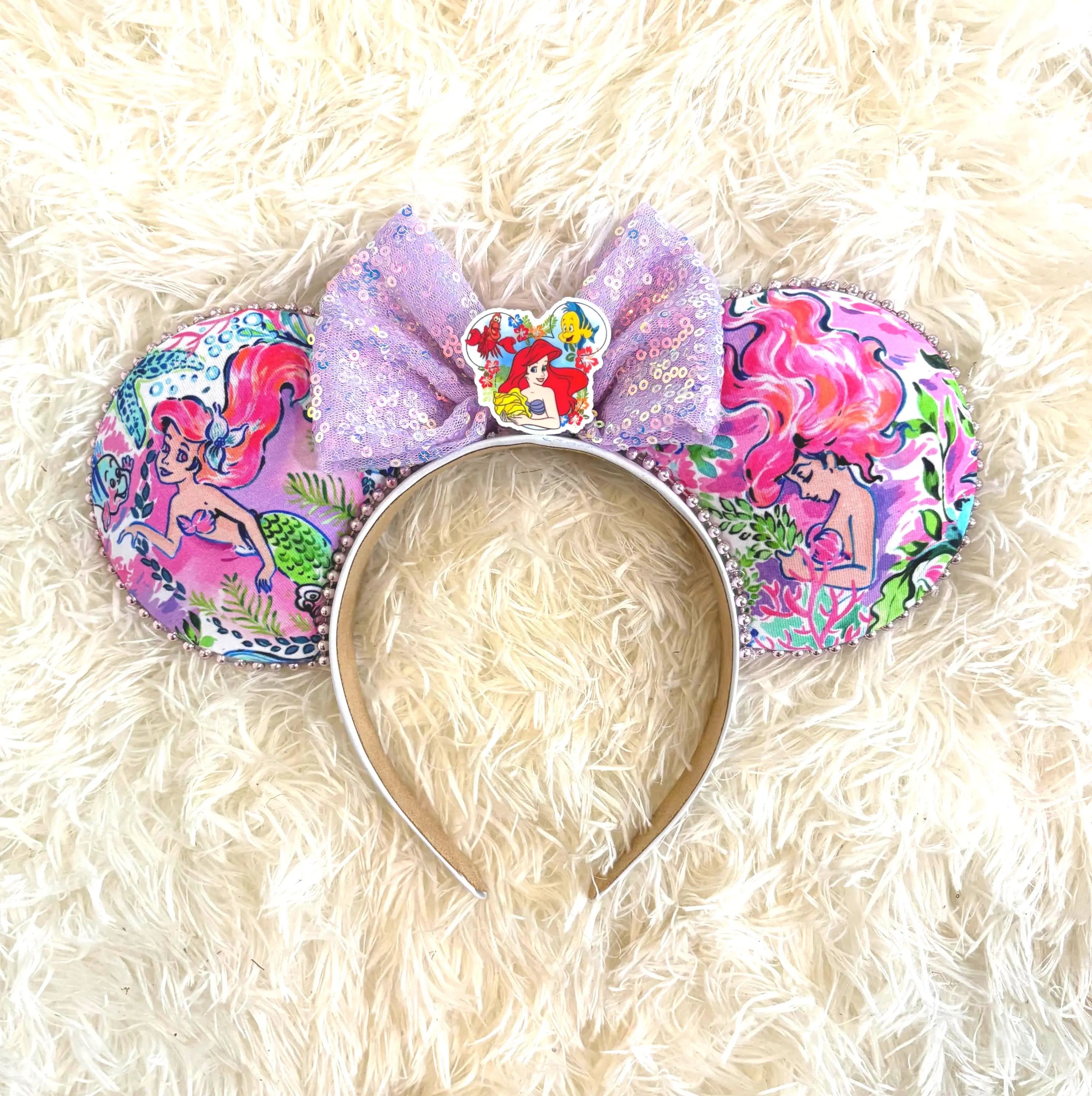 Mermaid Dreams Boutique Mouse Ear Headband with colorful mermaid-inspired print ears, lavender sequin bow, and handcrafted boutique design by Pixie Park Company