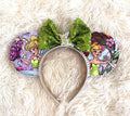 Pixie Dust Boutique Mouse Ear Headband featuring enchanting fairy-inspired artwork, an emerald green sequin bow, and handcrafted boutique detailing.