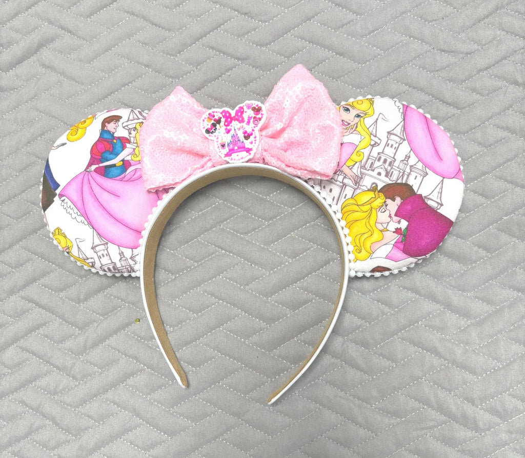 Once Upon a Dream Boutique Mouse Ear Headband featuring fairy tale princess-inspired artwork, a blush pink sequin bow, and handcrafted boutique detailing.