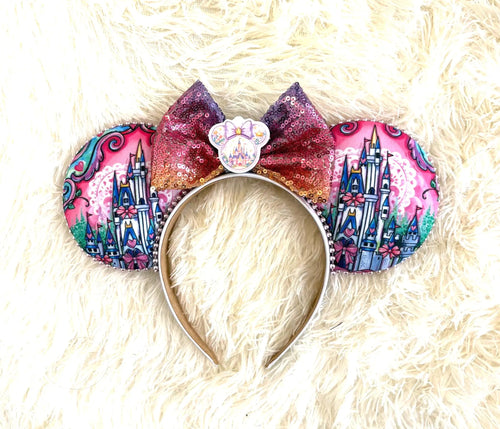 Castle Dreams Boutique Mouse Ear Headband featuring colorful fantasy castle artwork, an ombré sequined bow, and handcrafted boutique detailing.