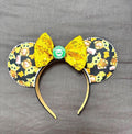 Morning Galaxy Adventure boutique mouse ear headband featuring galaxy-inspired character print, gold sequin bow, coffee-themed centerpiece and pearl trim.