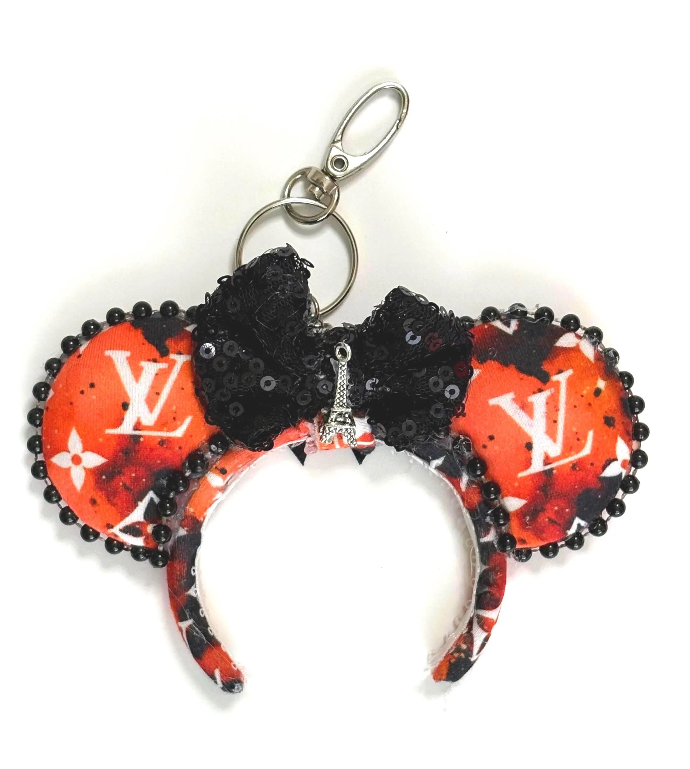 Handcrafted black and crimson designer-inspired mini ear keychain with black sequin bow and silver clasp by Pixie Park Co.