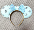 Handcrafted Blue Box Boutique mouse ear headband featuring designer-inspired robin's egg blue fabric, iridescent blue sequin bow, pearl trim, decorative mouse centerpiece, and lightweight comfort-fit headband.