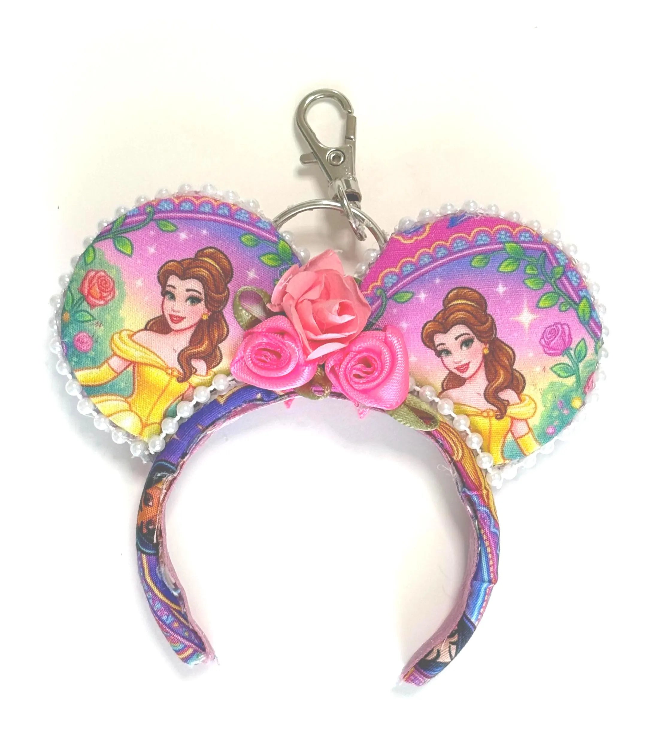Handcrafted Village Beauty mini ear keychain featuring storybook-inspired artwork, pink floral embellishments, pearl trim, silver clasp, and boutique styling by Pixie Park Co.