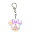 Lavender Kingdom Pocket Charm featuring a pastel castle, lavender bow with a golden crown, floral accents, and a premium resin charm with lobster clasp.