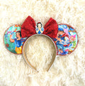 Magic Mirror Dreams Boutique Mouse Ear Headband featuring a storybook princess-inspired print, ruby red sequin bow, princess centerpiece, and handcrafted boutique styling by Pixie Park Co.