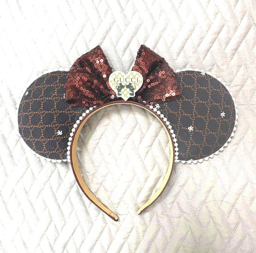 Roman Holiday Boutique Mouse Ear Headband featuring an espresso designer-inspired pattern, mocha sequin bow, pearl trim, and handcrafted boutique styling by Pixie Park Co.