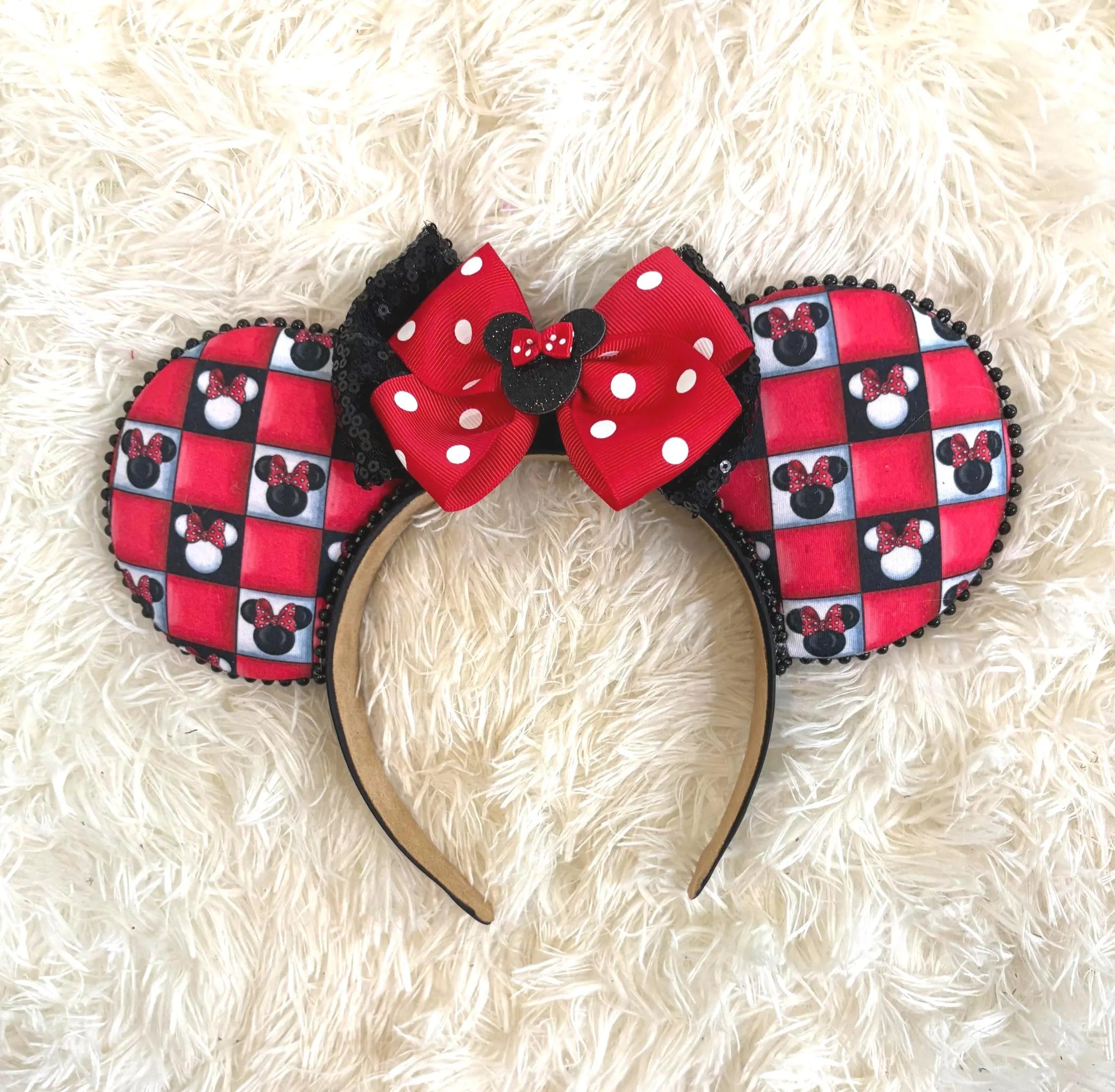 Park Avenue Chic Boutique Mouse Ear Headband featuring red and black buffalo plaid ears, layered black sequin accents, a red polka-dot bow, and handcrafted boutique styling by Pixie Park Co.