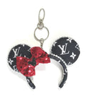 Handcrafted Metropolitan Chic mini ear keychain featuring black-and-white boutique-inspired fabric, sparkling red sequin bow, pearl trim, silver clasp, and handcrafted styling by Pixie Park Co.