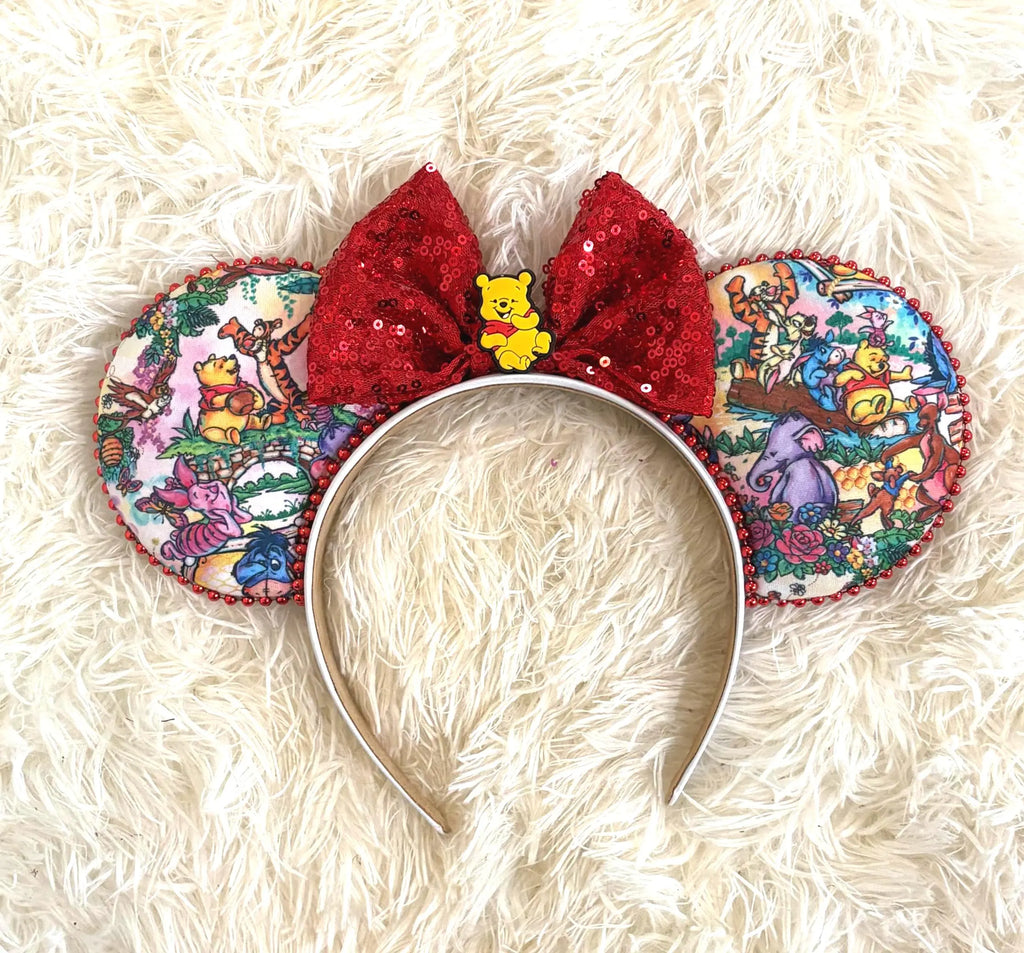 Hundred Acre Adventure Boutique Mouse Ear Headband featuring colorful storybook-inspired woodland friends with a ruby red sequin bow and boutique detailing.