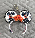 Handcrafted Midnight Elegance mini ear keychain featuring black-and-white boutique-inspired artwork, floral embellishment, pearl trim, silver clasp, and boutique styling by Pixie Park Co.