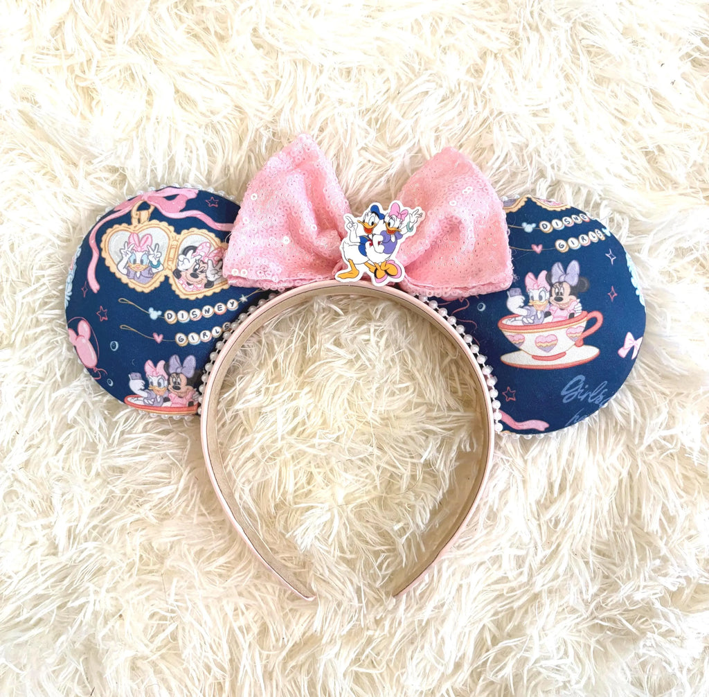 Park Besties Boutique Mouse Ear Headband featuring friendship-inspired artwork, blush pink sequin bow, handcrafted boutique styling, and premium comfort-fit headband by Pixie Park Company.