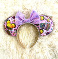 Handcrafted Park Treats Boutique Mouse Ear Headband from the Pixie Park Essentials Collection featuring colorful park snack-inspired artwork, a lavender sequin bow, and lightweight comfort for magical park adventures.