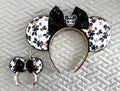 Handcrafted Midnight Elegance Pixie Pair featuring a matching mouse ear headband and coordinating Mini Magic Charm with elegant boutique styling, coordinating bow, decorative centerpiece, beaded trim, and handcrafted craftsmanship.