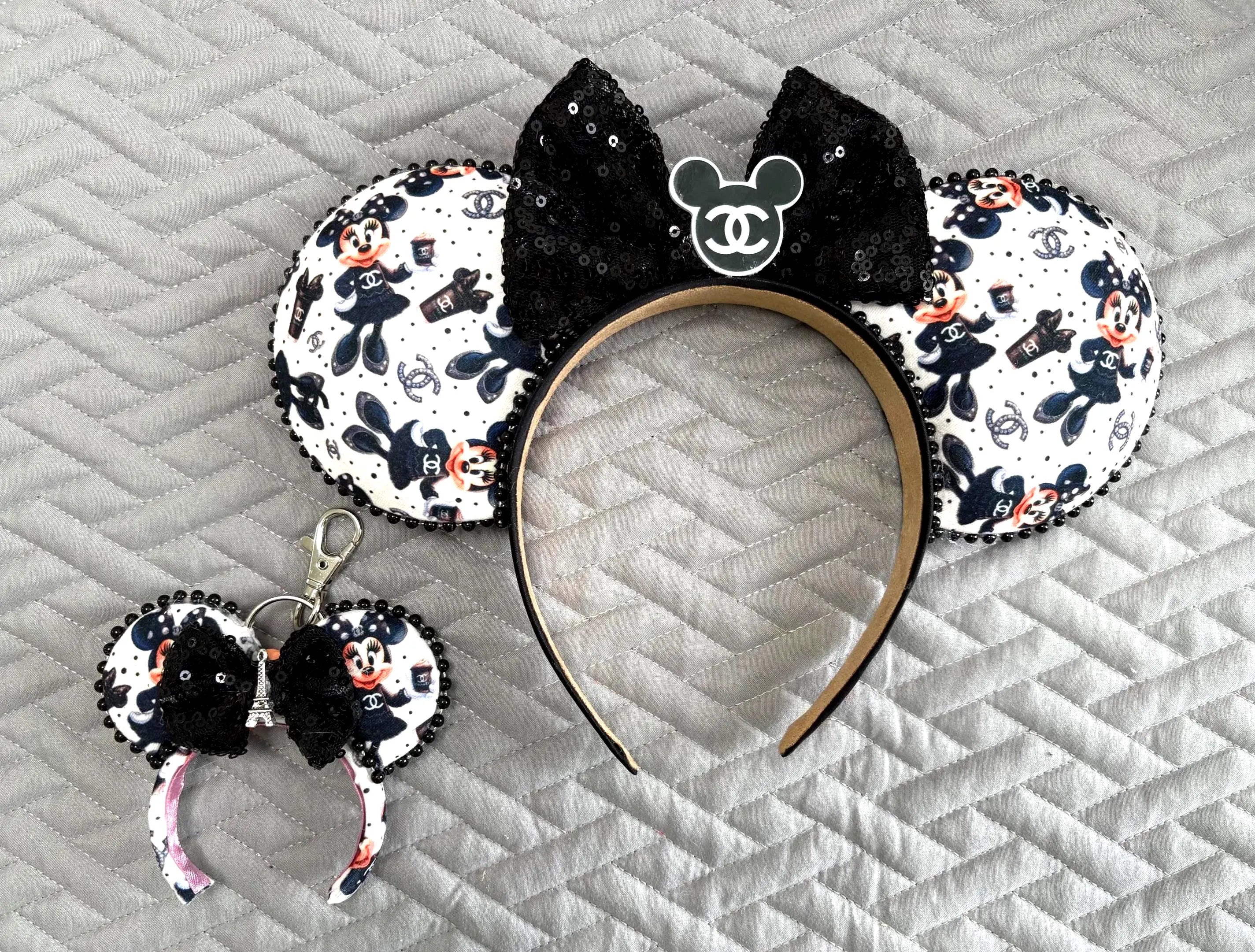 Handcrafted Midnight Elegance Pixie Pair featuring a matching mouse ear headband and coordinating Mini Magic Charm with elegant boutique styling, coordinating bow, decorative centerpiece, beaded trim, and handcrafted craftsmanship.