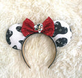 Wild Luxe boutique mouse ear headband featuring a black-and-white fashion-inspired print, ruby red sequin bow, shopping-themed mouse centerpiece, and pearl trim.