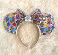 Park Celebration Boutique Mouse Ear Headband featuring a colorful park-inspired character collage, castle centerpiece, pearl trim, and handcrafted boutique styling by Pixie Park Co.