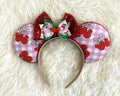 Handcrafted Cherry Jubilee Signature mouse ear headband featuring pink gingham cherry artwork, a sparkling red sequined bow, layered cherry bow accents, a cherry centerpiece, and boutique craftsmanship by Pixie Park Company.