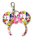 Handcrafted Lemon Blossom Mini Magic Charm featuring citrus-inspired artwork, a pink boutique bow with sparkling accents, a miniature mouse ear design, and a lobster clasp by Pixie Park Company.