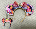 Pixie Park Company Island Spirit Pixie Pair featuring a coordinated Signature mouse ear headband and matching Mini Magic Charm with tropical island-inspired artwork, a coordinating boutique bow, decorative beaded trim, and handcrafted boutique styling.