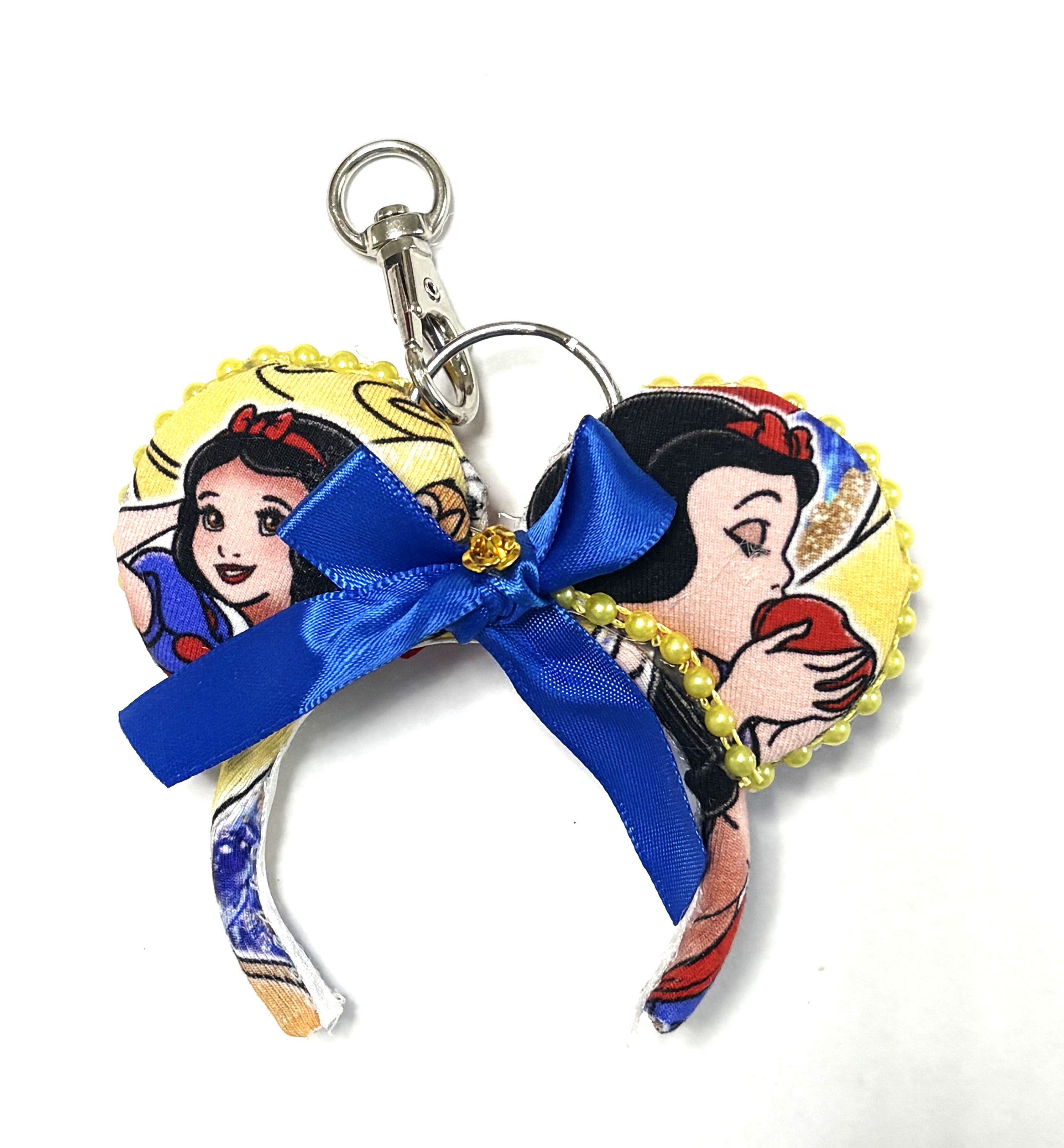 Handcrafted Dreaming Princess Mini Magic Charm featuring elegant pink and gold boutique-inspired details with a gold-tone key ring, perfect for bags, backpacks, purses, and magical park adventures.