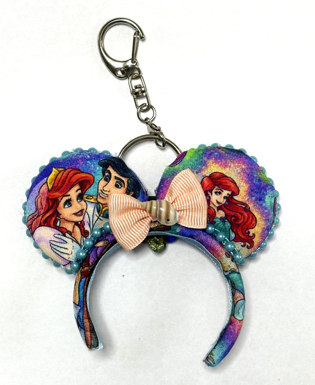 Handcrafted A Mermaid's Wish Mini Magic Charm featuring elegant ocean-inspired boutique details with a gold-tone key ring, perfect for bags, backpacks, purses, and magical park adventures.