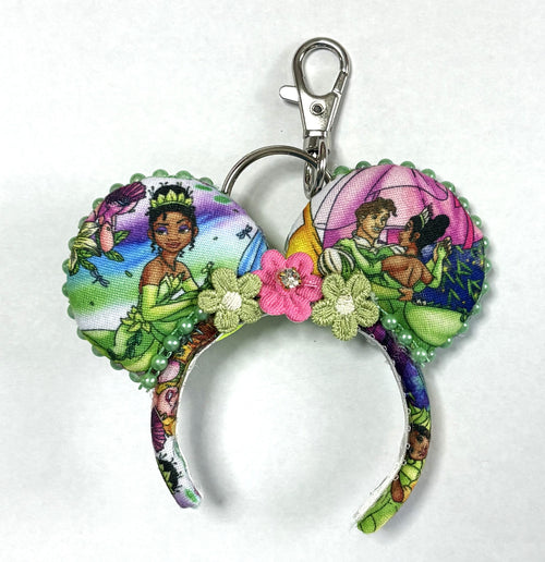 Handcrafted Bayou Blossom Mini Magic Charm featuring elegant floral bayou-inspired boutique styling with a gold-tone key ring, perfect for bags, backpacks, purses, and magical everyday adventures.