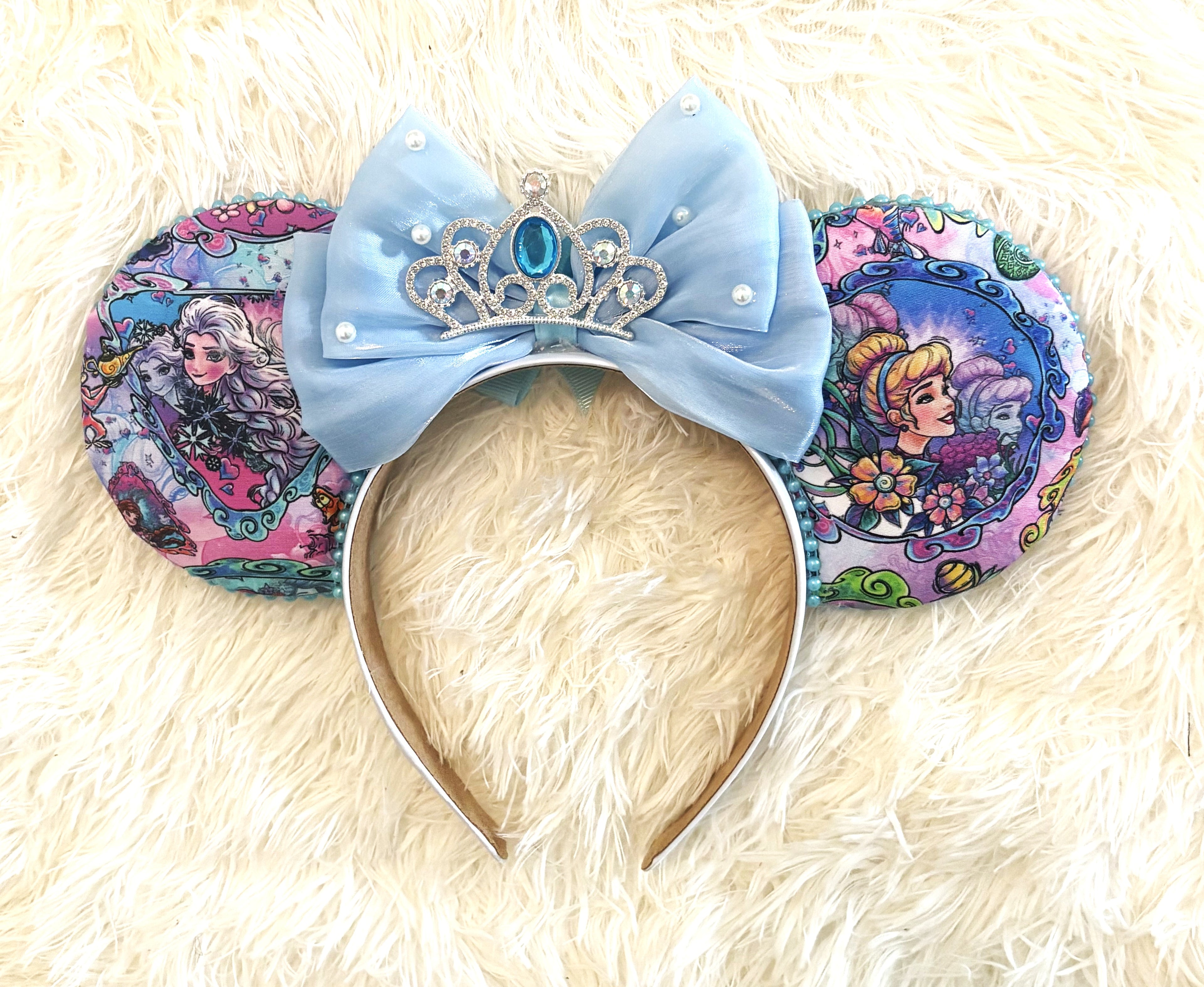Handcrafted Frost & Fairytales – Princess Duos Signature mouse ear headband featuring elegant boutique styling inspired by a sparkling winter kingdom and a timeless royal fairy tale with handcrafted layered details.