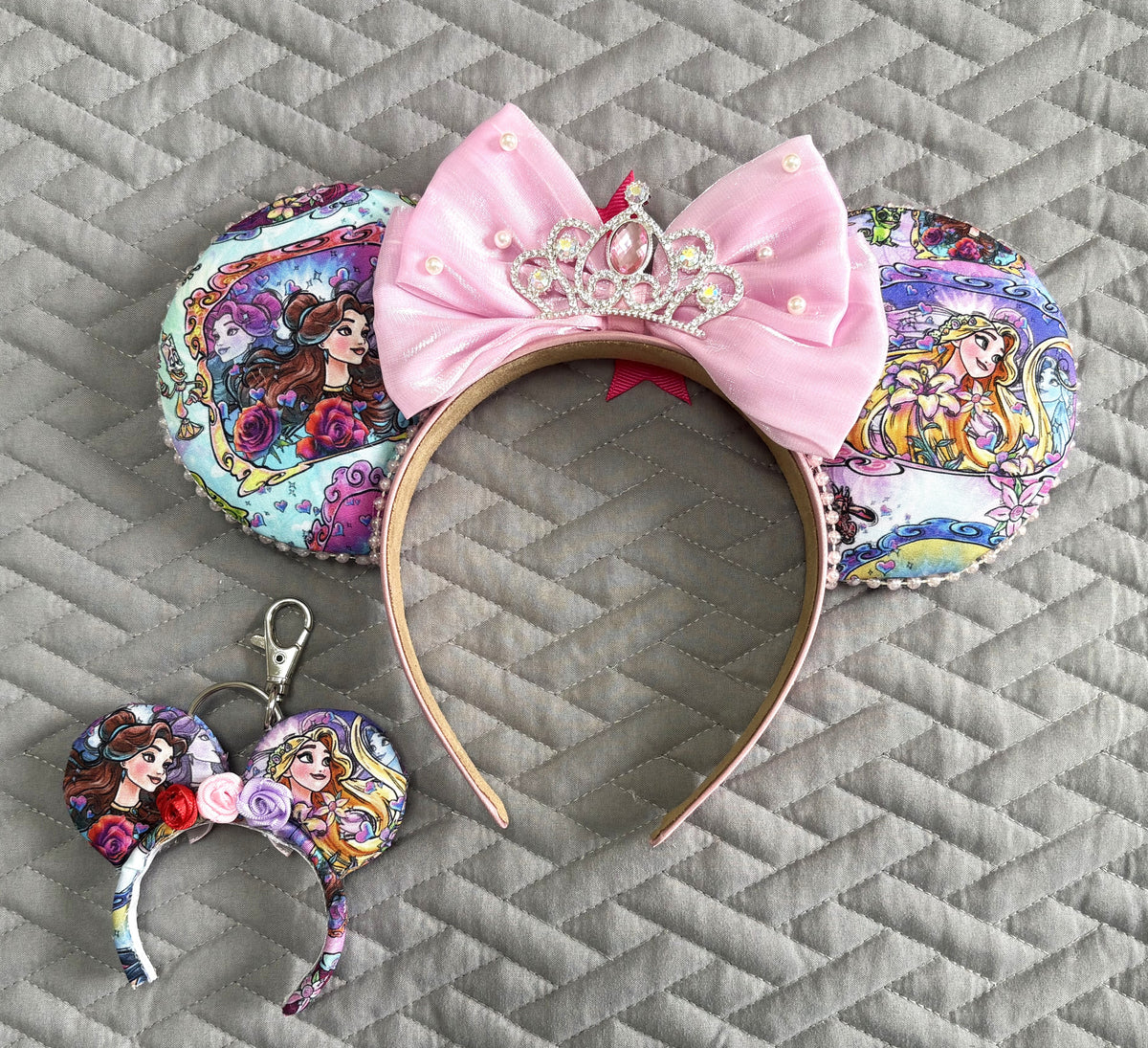 Handcrafted Tower & Rose – Princess Duos Pixie Pair featuring a boutique mouse ear headband with a matching Mini Magic Charm inspired by a fairy tale tower and an enchanted rose.