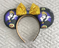 Handcrafted fairy tale queen-inspired Signature mouse ear headband featuring regal artwork, a rich purple sequined bow, boutique detailing, and a lightweight comfort-fit design for Halloween and magical park adventures.