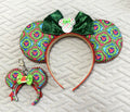 Merry Mousemas Christmas Pixie Pair with handcrafted holiday wreath mouse ear headband, evergreen velvet bow and coordinating Mini Magic Charm.