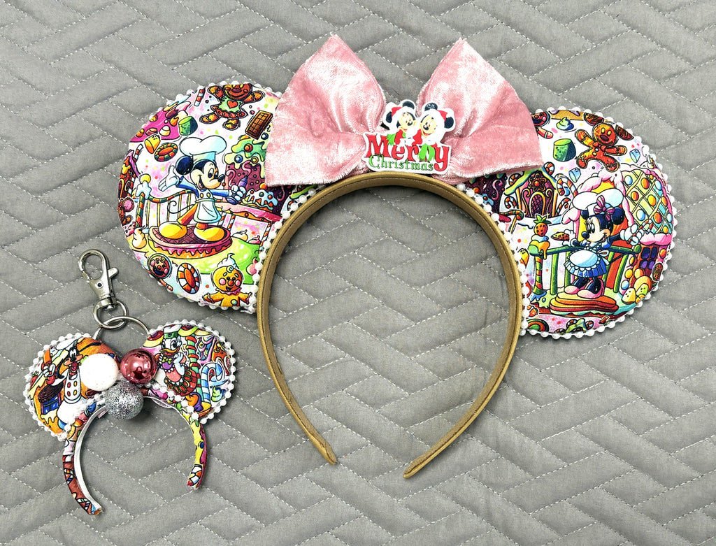 Sweet Holiday Wishes Pixie Pair featuring colorful Christmas mouse ear headband with pink velvet bow, Merry Christmas centerpiece, pearl trim, and matching mini ear bag charm with festive ornaments.