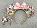 Sweet Holiday Wishes Pixie Pair featuring colorful Christmas mouse ear headband with pink velvet bow, Merry Christmas centerpiece, pearl trim, and matching mini ear bag charm with festive ornaments.